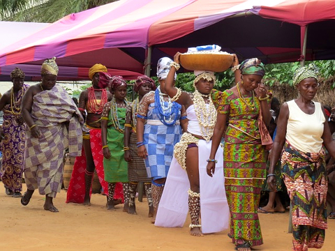 Festival procession of women in traditional dress